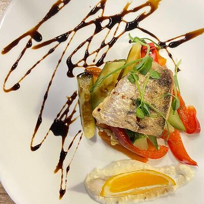 Заказать Судак на подушке из овощей,