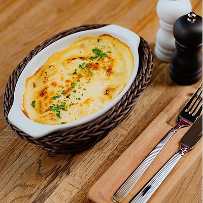 Заказать Запеченные пельмени под сырным соусом, Bresto Testo